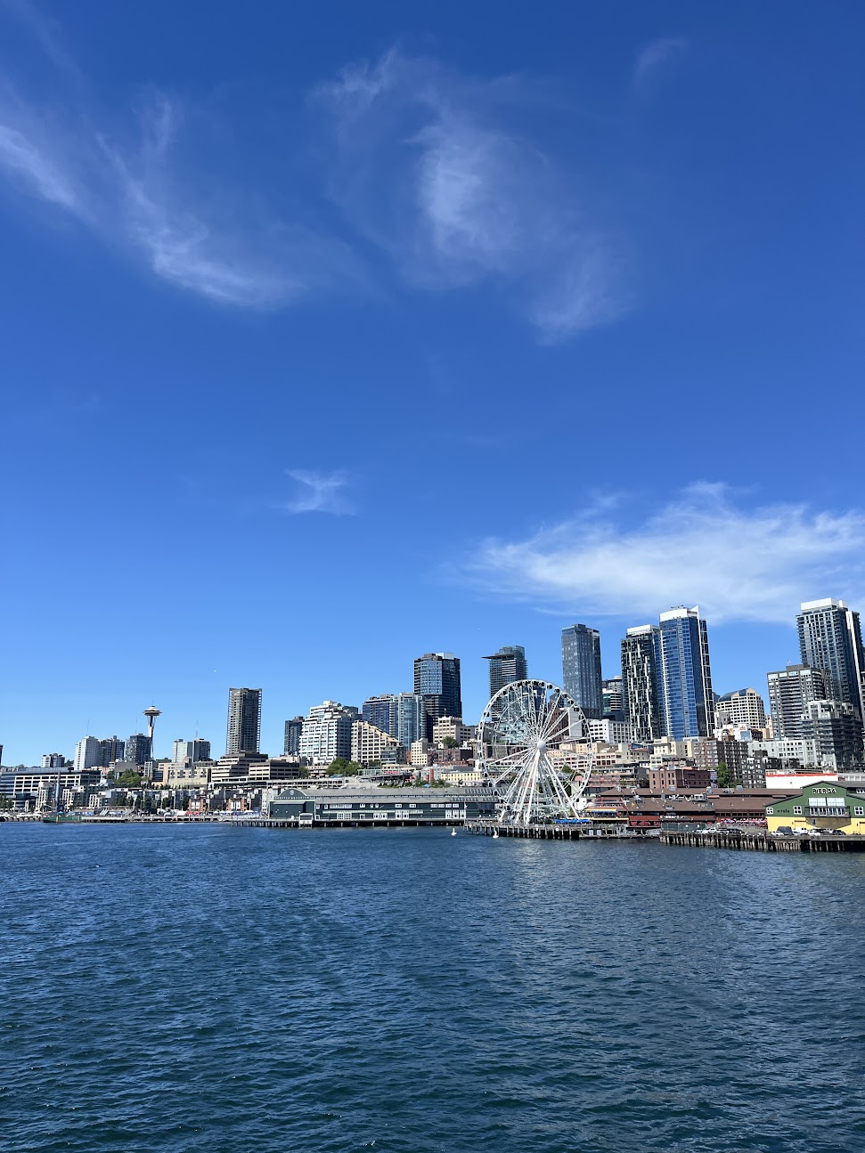 Photo of Seattle Skyline during the day on a ferry